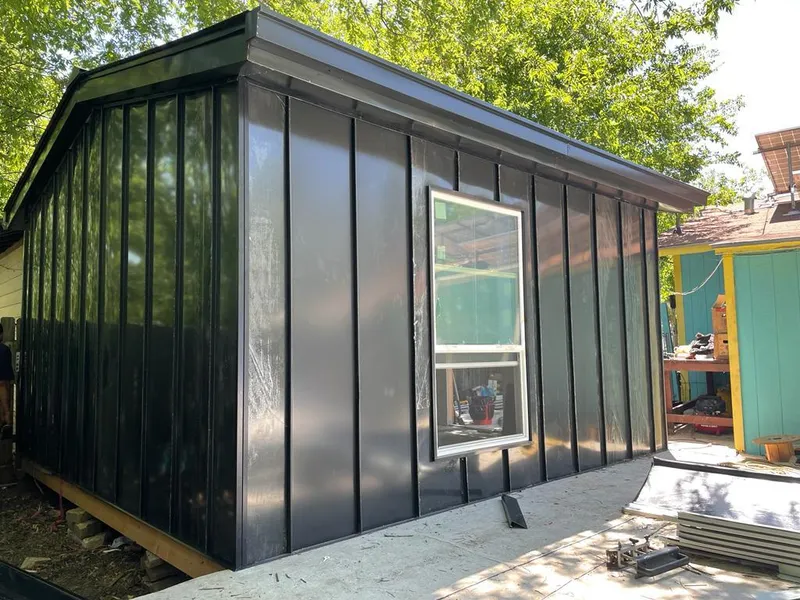 Black standing seam metal wall panels for Roof Inspection in Fort Pierce North