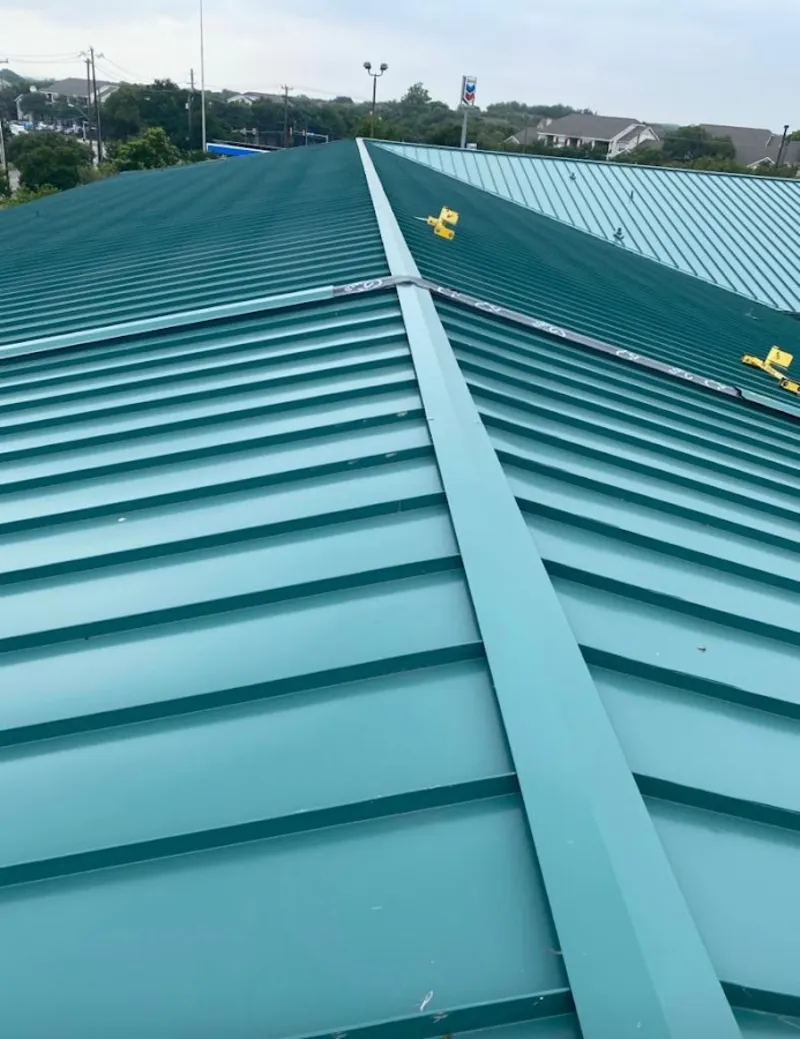 Green commercial metal roof ridge and valley for Metal Roof Repair in Fort Pierce North